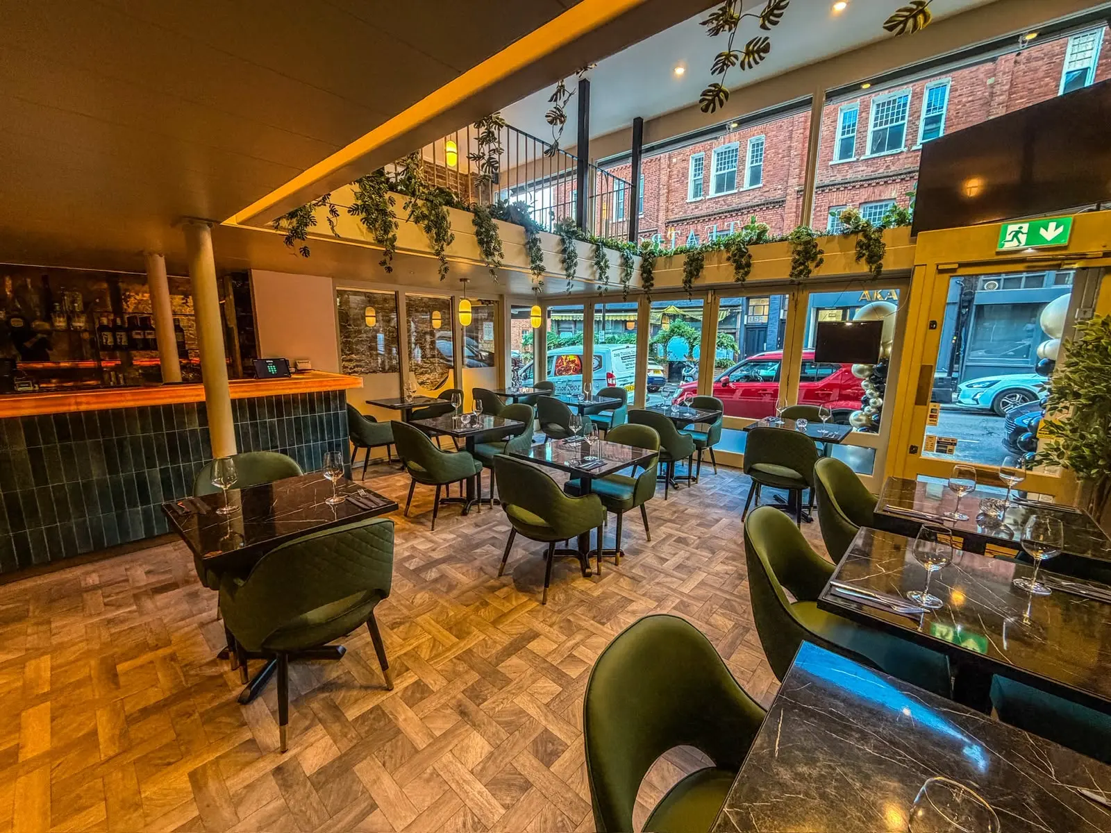 Inside Teatro: green velvet chairs, marble tables and the bar, West Hampstead